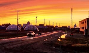 Tony Eetak from @1860 Winnipeg Arts captured this photo of greenhouses in front of a beautiful northern sunset.